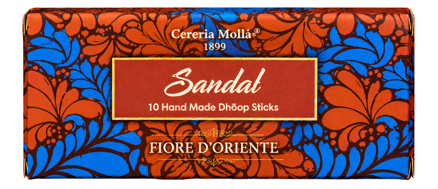 Cereria Molla Sandal Dhooop Sticks packaging box, featuring a vibrant floral pattern in orange-red and blue with a central red label.